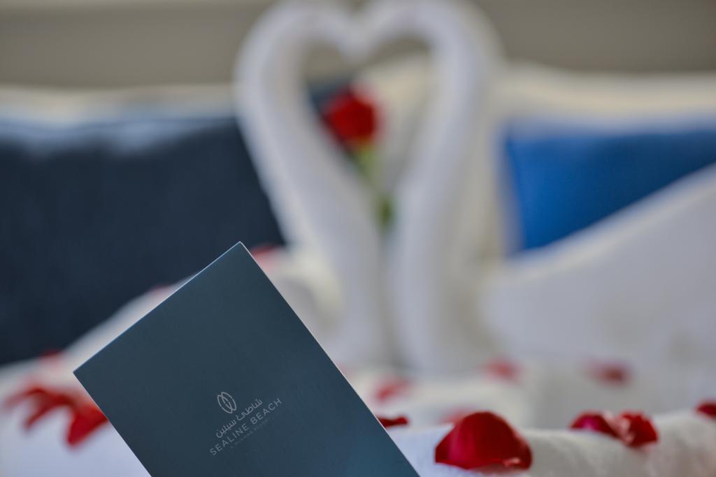Sealine Beach, A Murwab Resort มีไซอีด ภายนอก รูปภาพ A menu at the Waldorf Astoria Ras Al Khaimah
